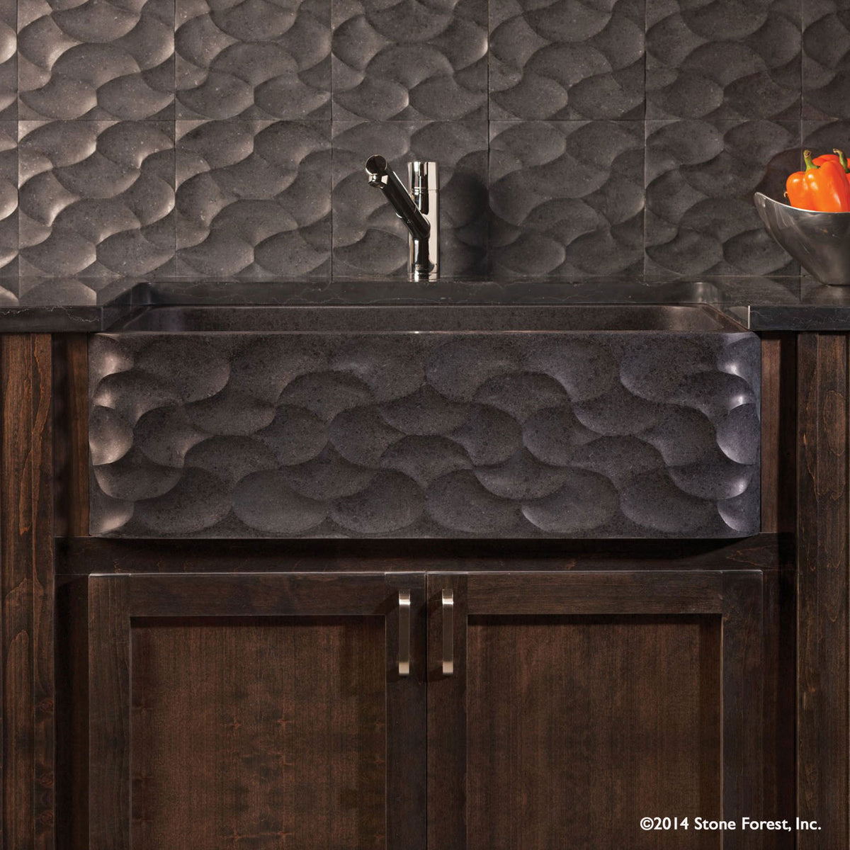Wave Front Farmhouse sink carved from basalt with a honed finish. image 1 of 1