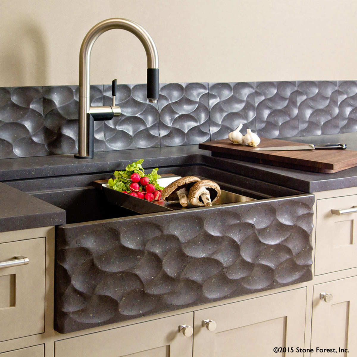 Wave Farmsink with workstation ledge to hold colanders, cutting boards and more. Carved from solid block of basalt. image 1 of 1