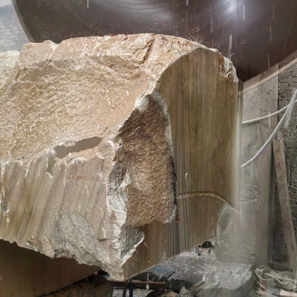 block of grigio sandstone being cut