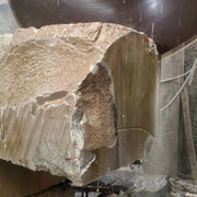 block of grigio sandstone being cut