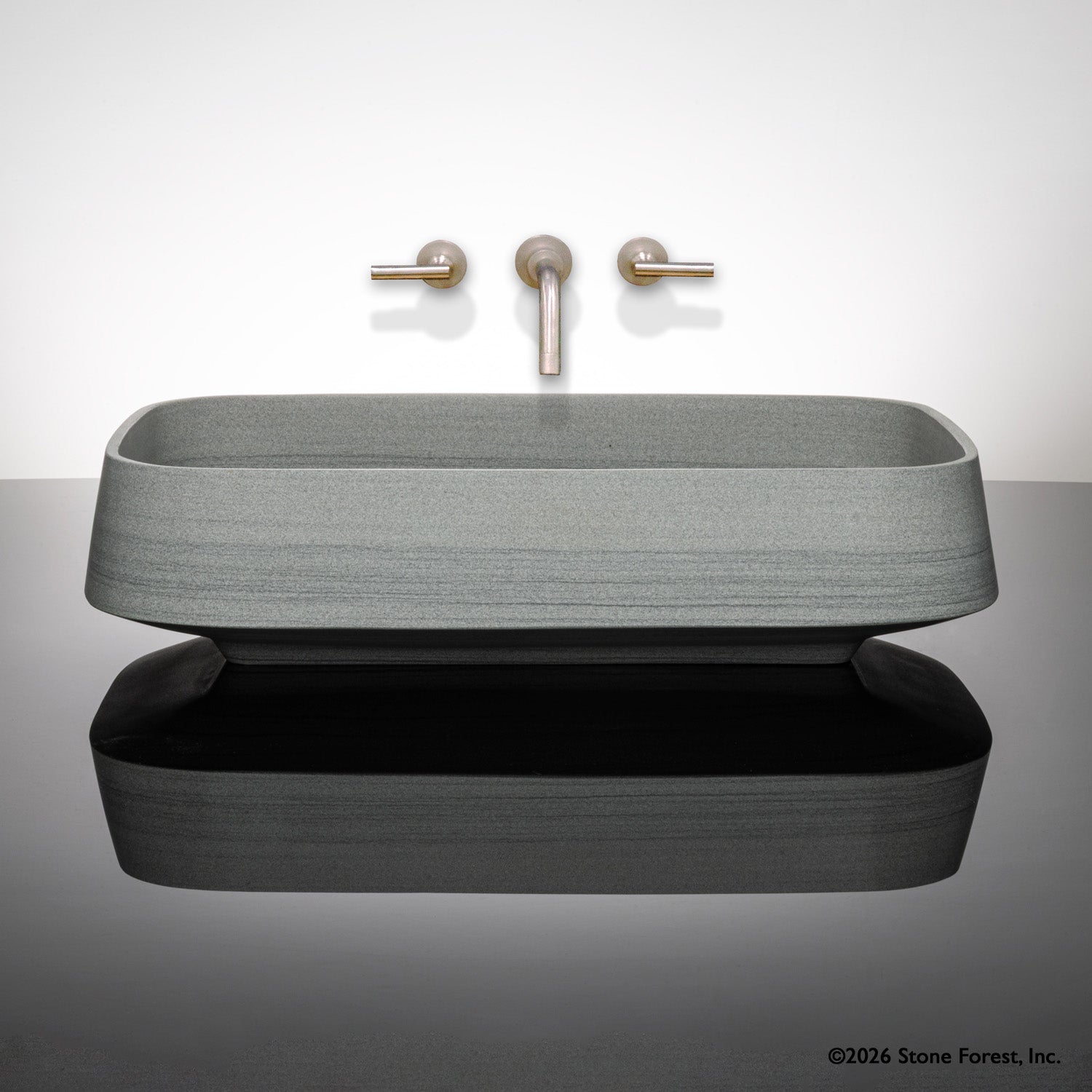 Forma Vessel Sink carved from grigio sandstone