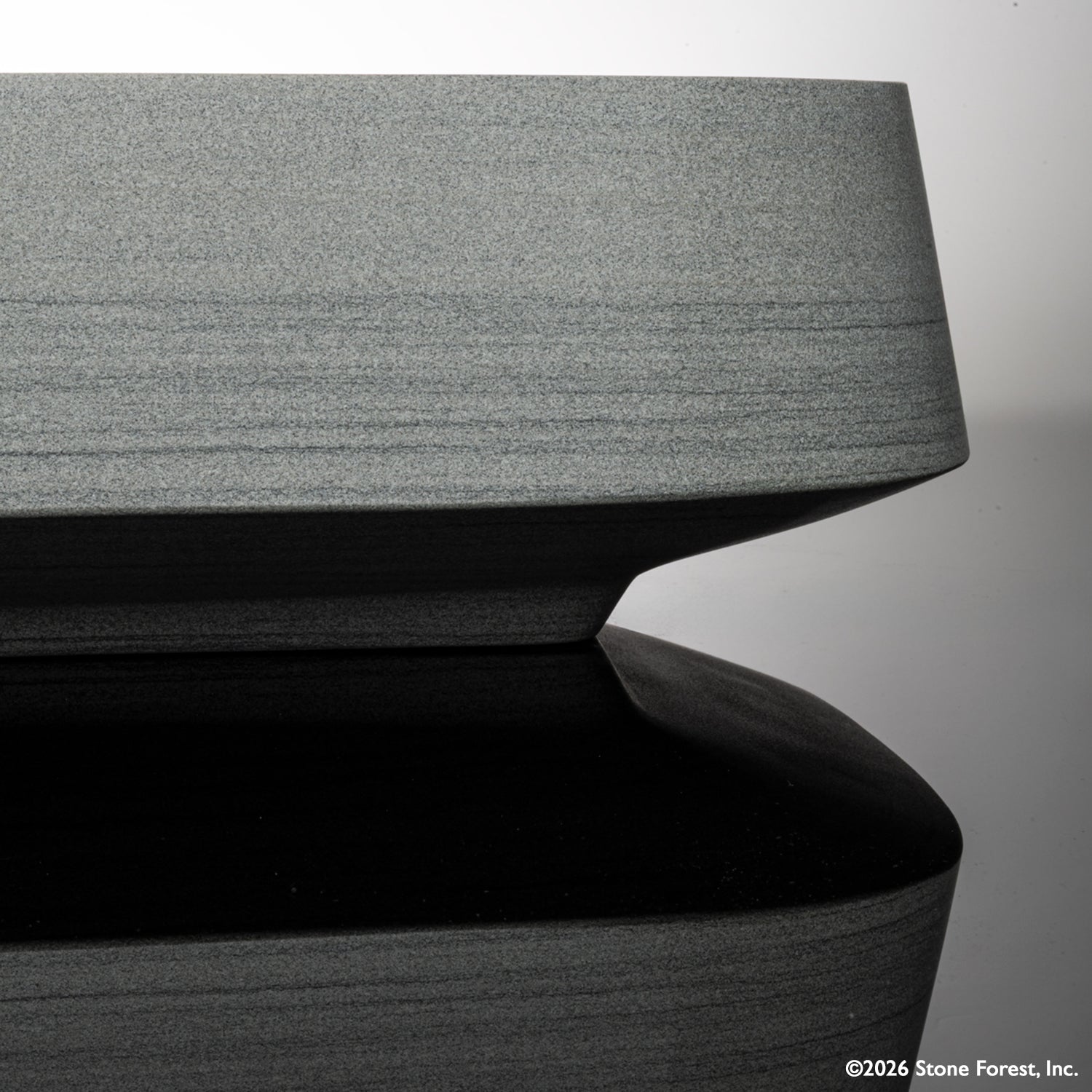 Rectangular gray vessel sink carved from grigio sandstone detail