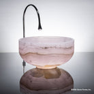 Round vessel sink called Tazz in pink onyx