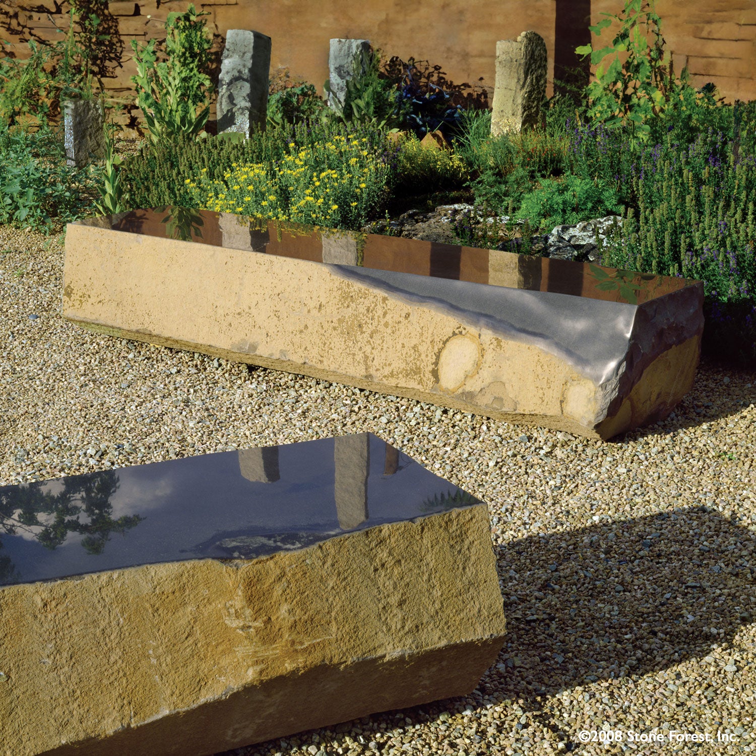 A natural basalt column  bench with the top facet polished to create a smooth surface to sit on.  These one-of-a-kind benchs are available in varying lengths, ranging from 72 to 90 inches.