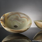  Beveled Round vessel sink carved  from multi-onyx with a polished  finish.