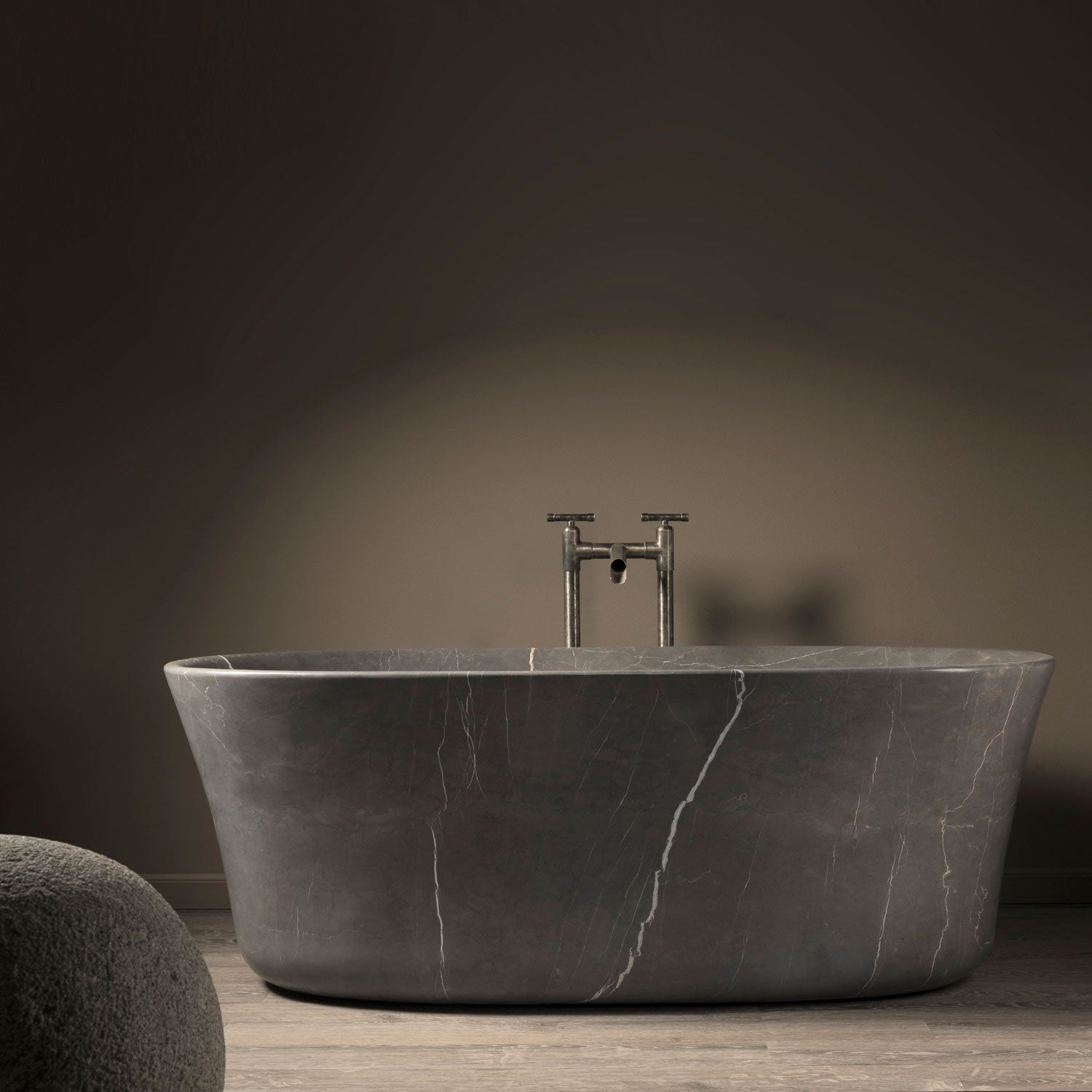 Calma bathtub in marquina taupe marble