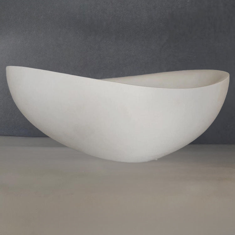 Papillon bathtub in desert cream limestone