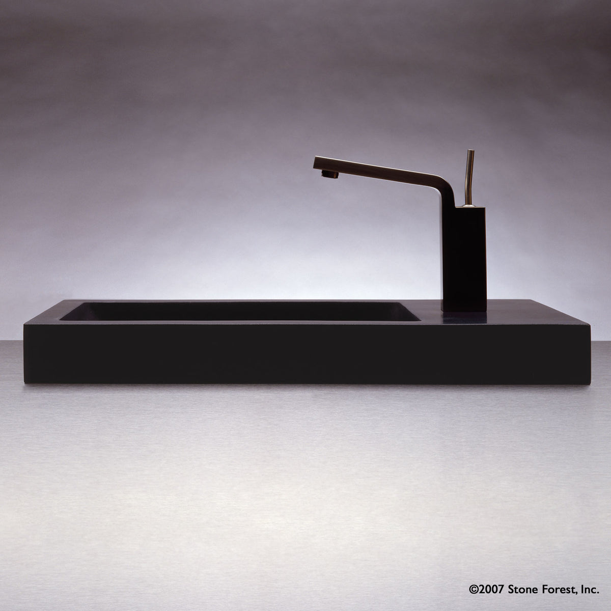 Bento vessel bath sink in black granite with honed finish.  image 1 of 2
