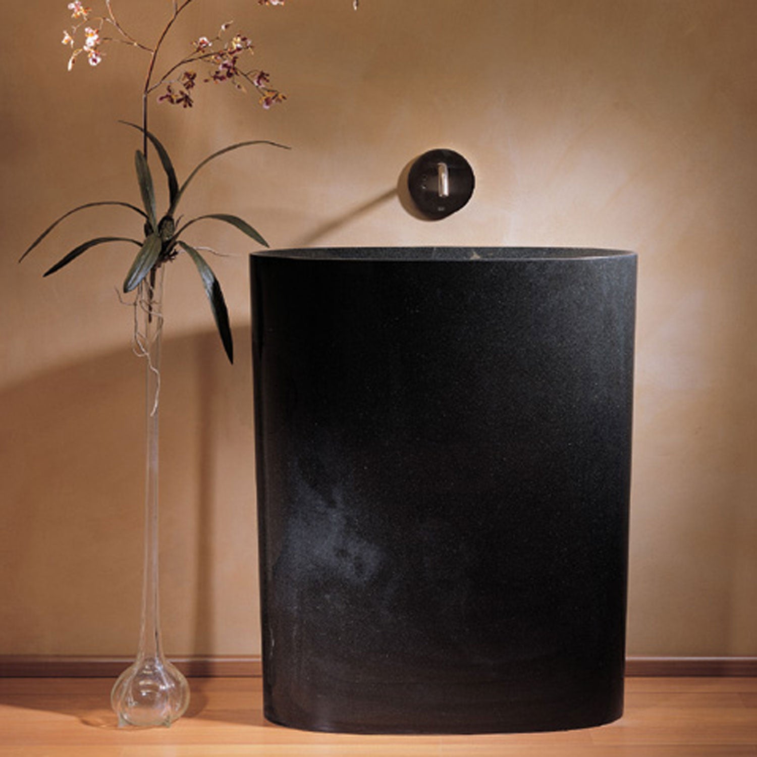 Infinity pedestal sink in polished black granite