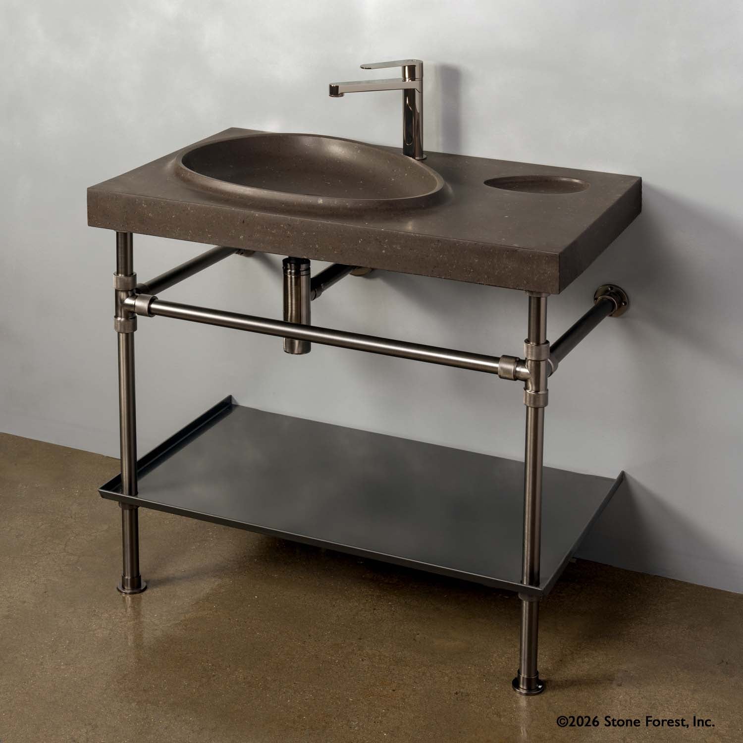 Tidal Pool Vanity Sink on Elemental Classic Legs with a crossbar.; with a folded metal tray shelf. Carved from noce basalt