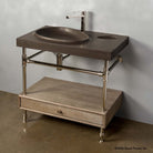 Tidal Pool Vanity Sink on Elemental Classic Legs with a crossbar and 6"h drawer. Carved from noce basalt