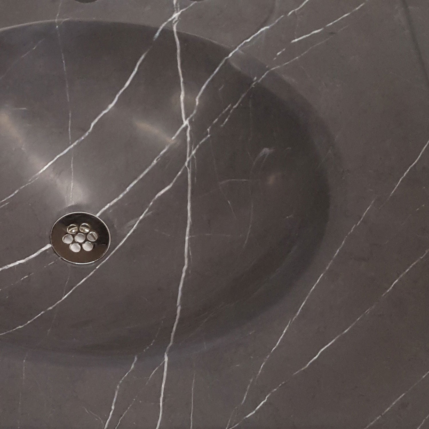 detail of sink bowl in marquina taupe marble