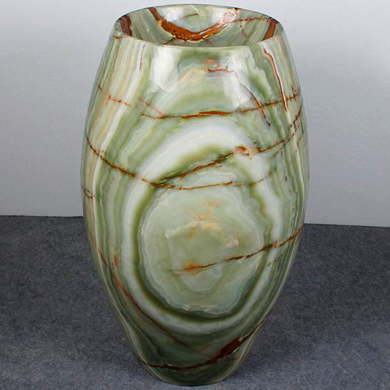 Barrel pedestal sink in multi-onyx 