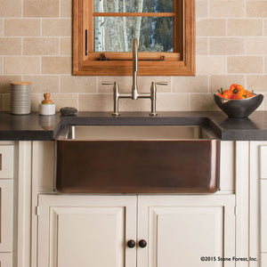 Farmhouse sink with stainless steel interior and copper exterior image 1 of 3
