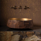 Edo Vessel Sink in Golden Bronze on stone countertop