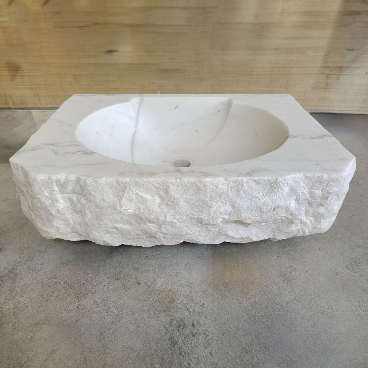 Custom Lavatory Vanity carved from luna bianca marble with rough chiseled exterior image 1 of 1