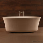 Calma Bathtub carved from  a solid block of desert cream limestone