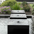 Custom Garden Fountain carved from black granite