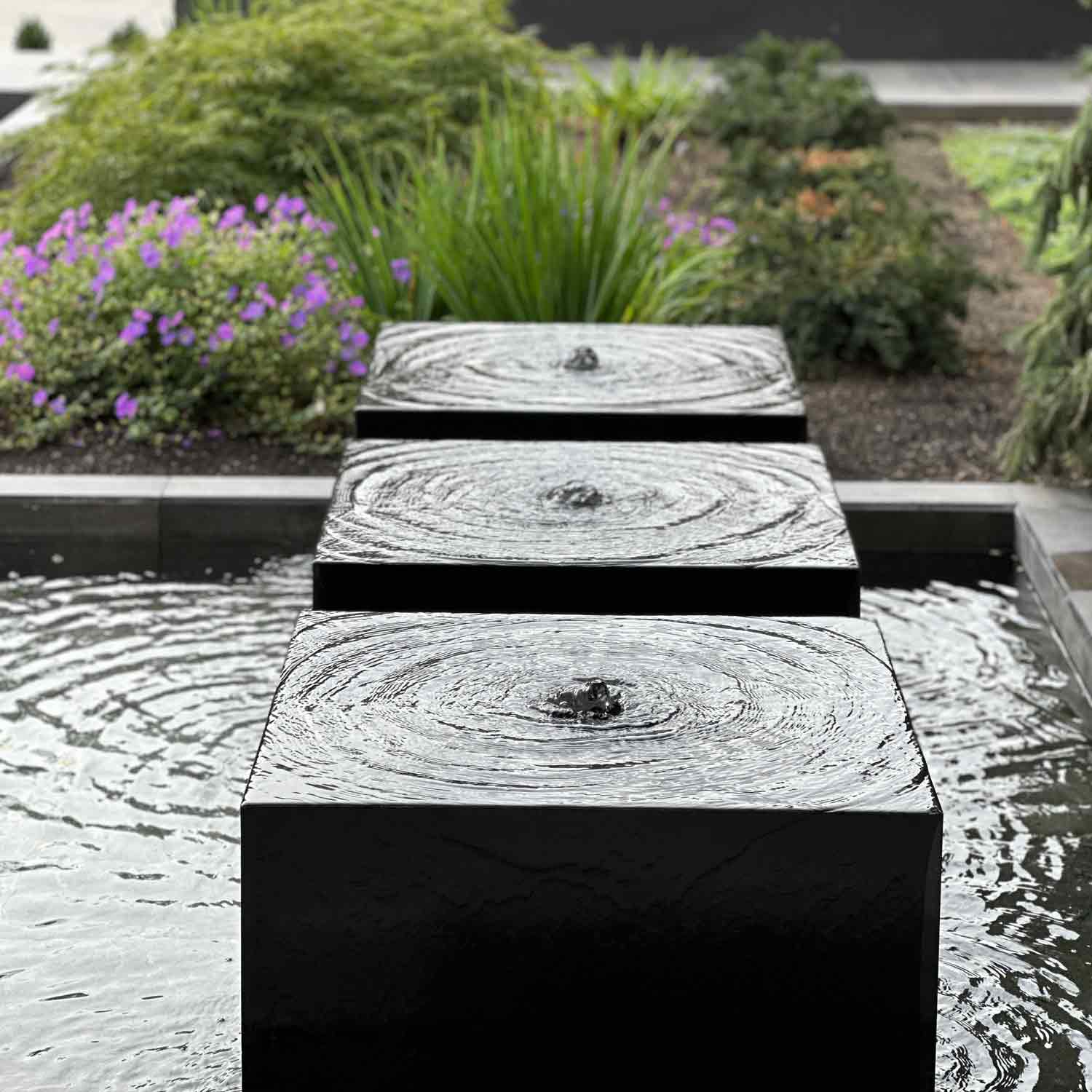 Custom Garden Fountain carved from black granite