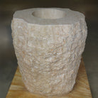Papiro Cream pedestal sink with polished top and chiseled exterior