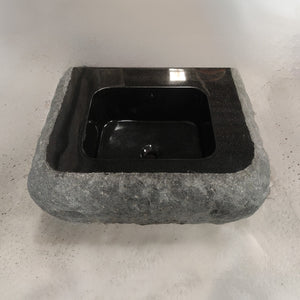 Custom Lavatory Vanity carved from black granite with rough chiseled exterior image 1 of 1