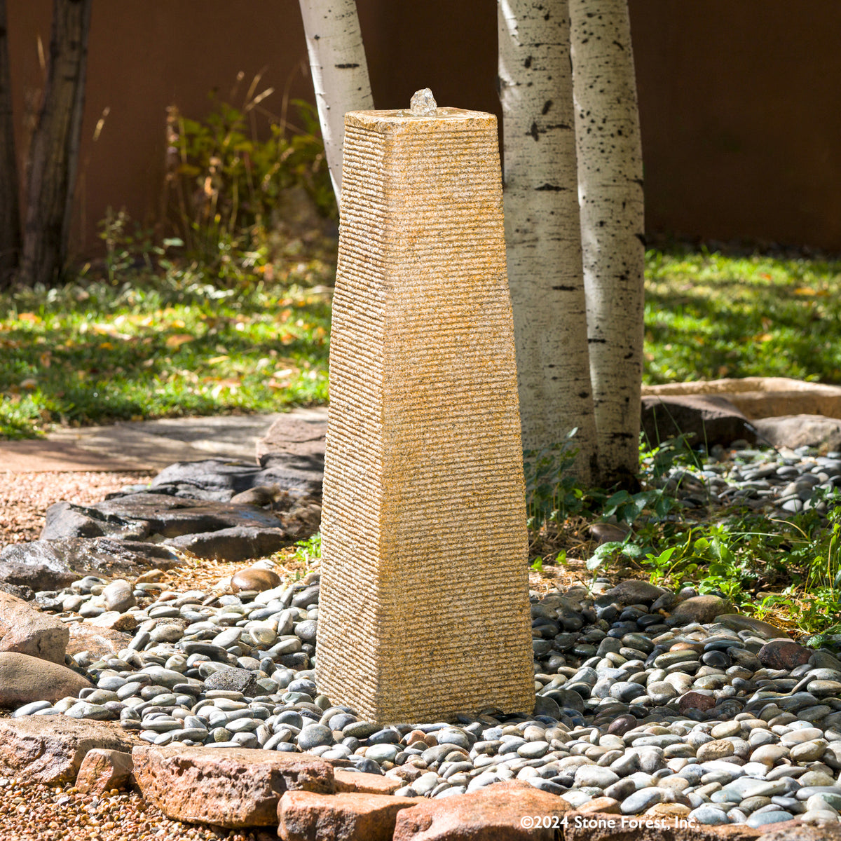 The Obelisk Fountain is a stone pillar, typically having a square cross-section and a pyramidal top. Set it up as a monument or landmark. Carved from Beige Granite. image 2 of 2
