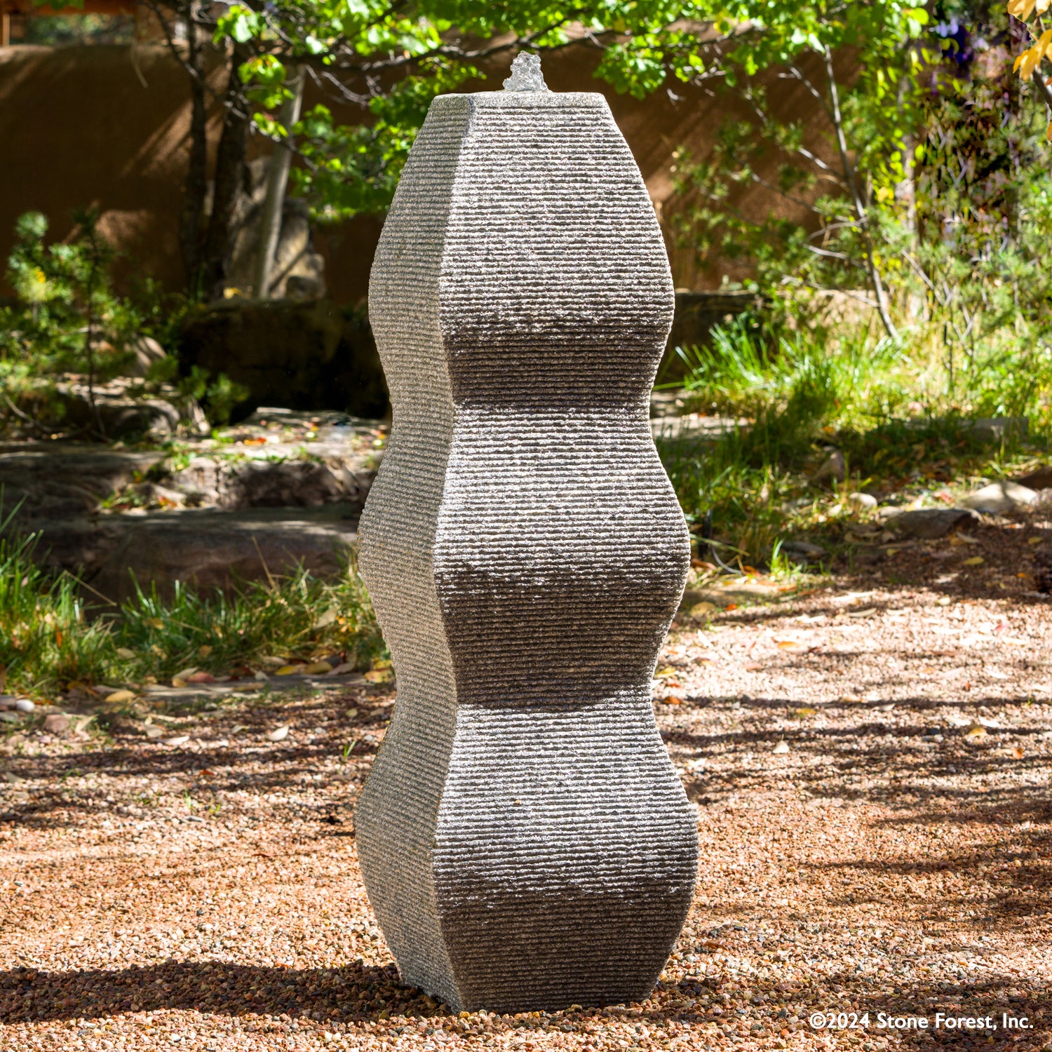 The Wave Fountain sculpted from a block of black & white  granite.