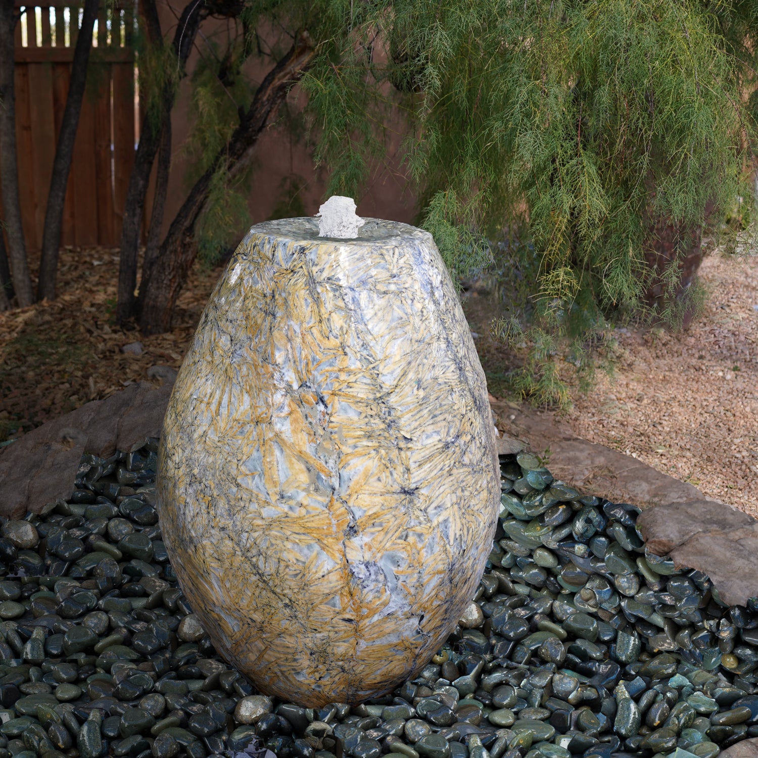 Large stone sculptural fountain carved from bamboo marble
