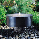 Stone Forest Polished Millstone garden fountain carved from black granite
