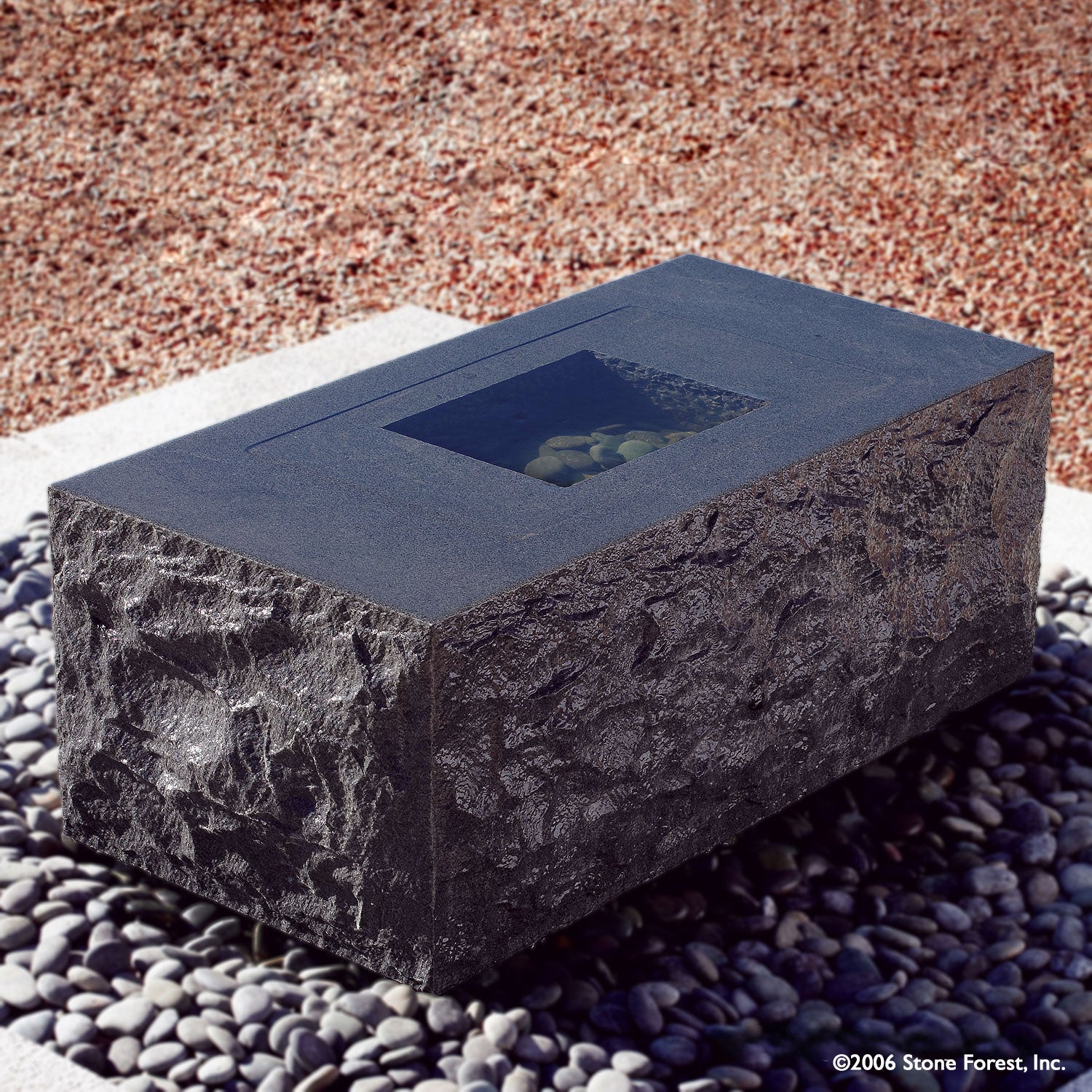 Stone Forest Water Table garden fountain in gray granite