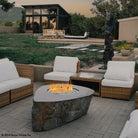 The Natural Fire Boulder is carved from a monolithic natural granite boulder