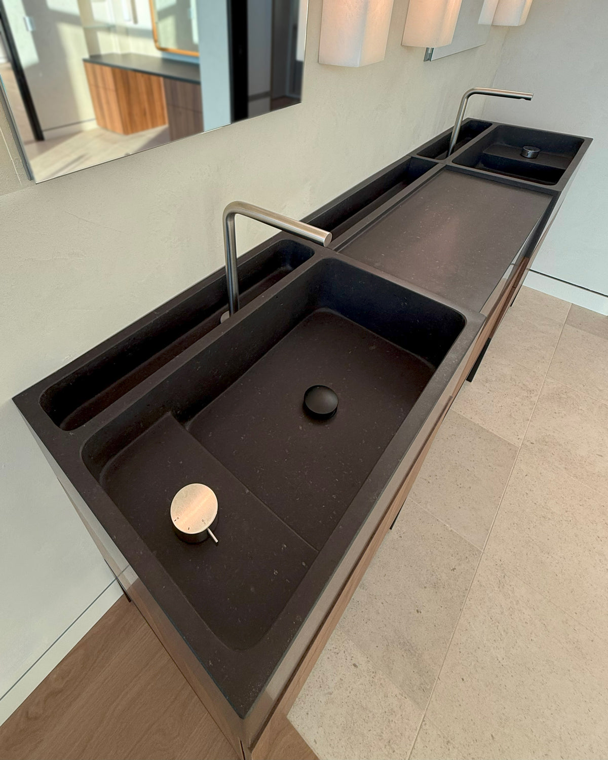 Custom Double Vanity in honed black granite high-angle view