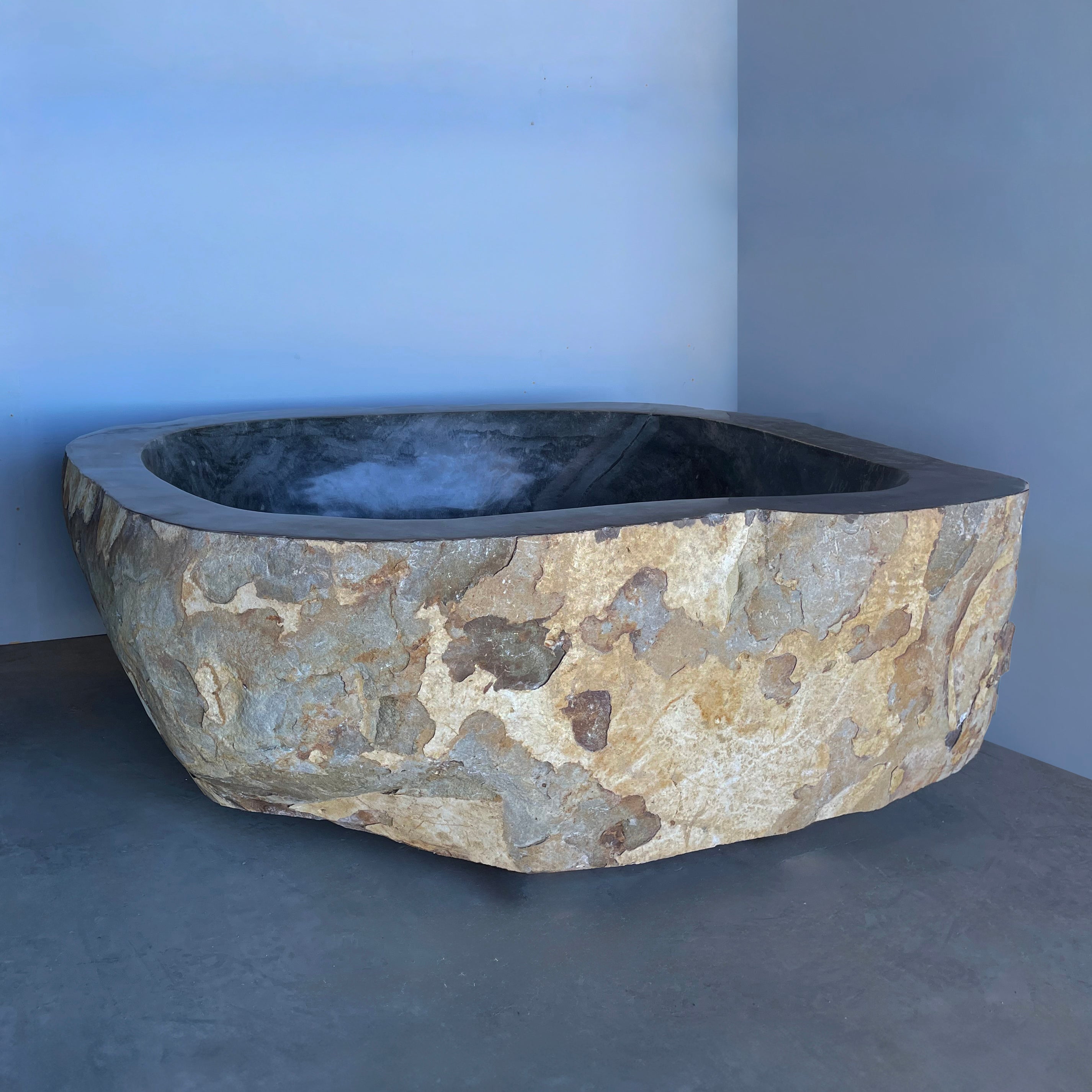 Natural stone bathub side view