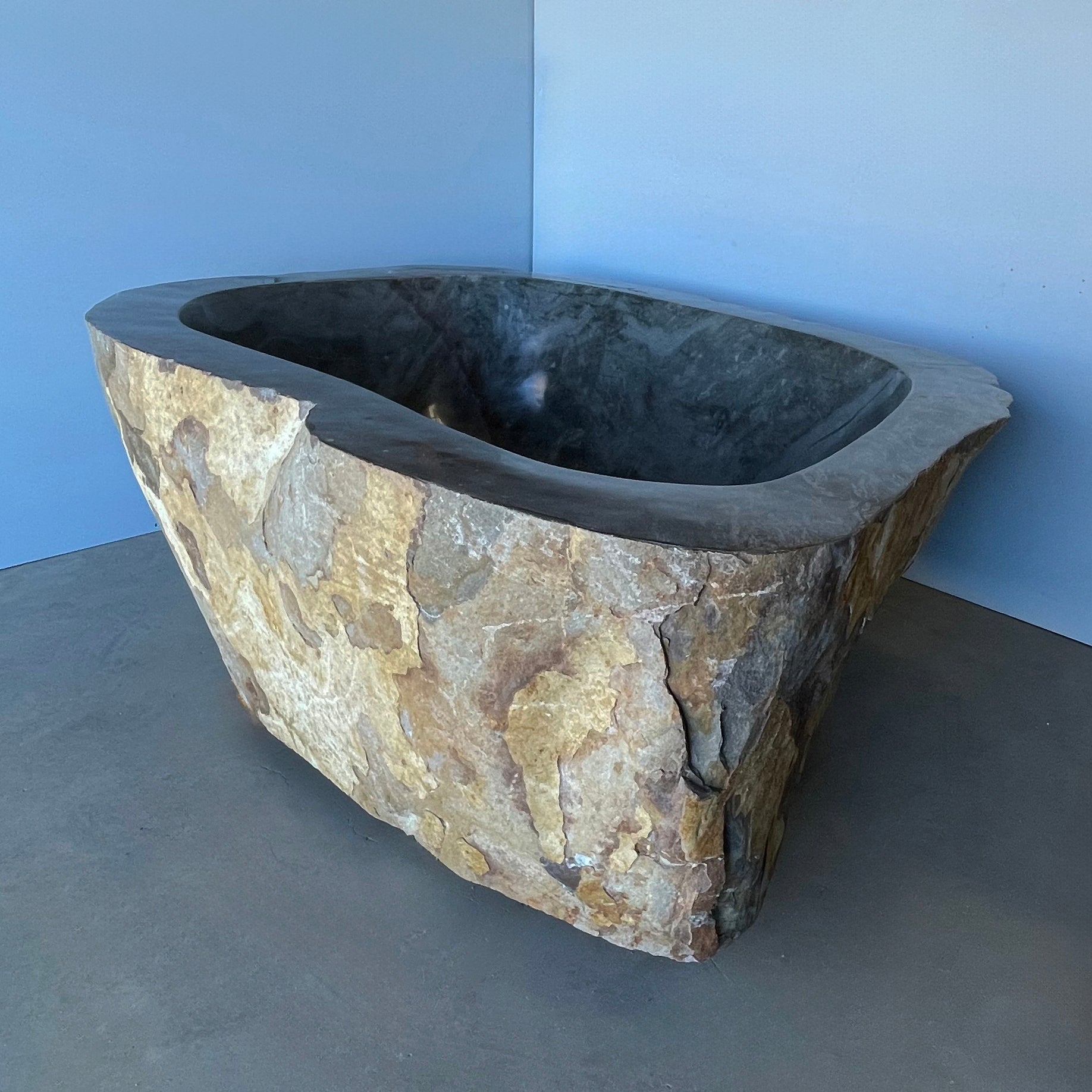 Natural stone bathub end view