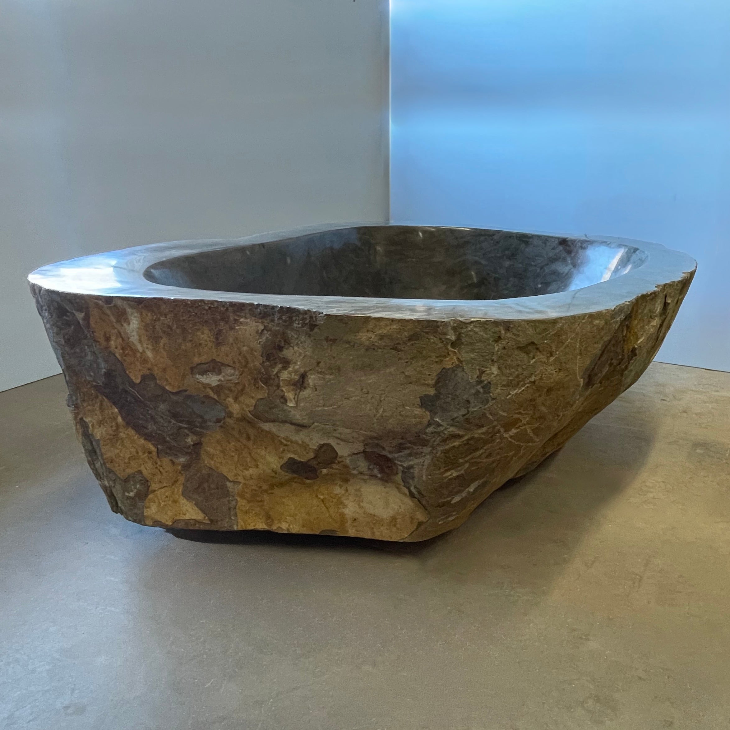 Natural stone bathub side view