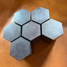 Hexagonal tables in honed basalt