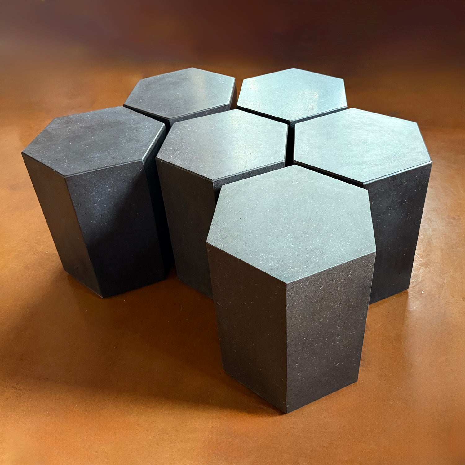 Hexagonal tables in honed basalt