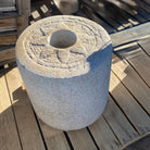 Colossal Antique Grinding stone in beige granite