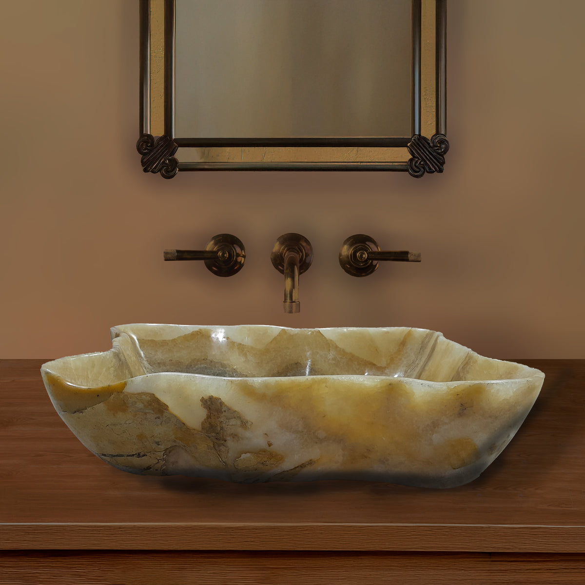 Onyx sink with a mirror above in a bathroom setting. image 1 of 2