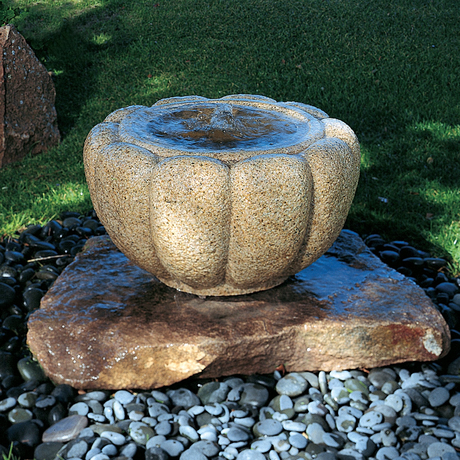 24" Lotus Basin embodies the traditional Japanese stone basin style. It is drilled giving it the the capacity to be a "bubbling" fountain