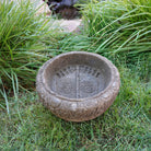 Lotus Basin is carved from Verde Basalt, featuring Buddha Feet details carved into the bottom of the basin.
