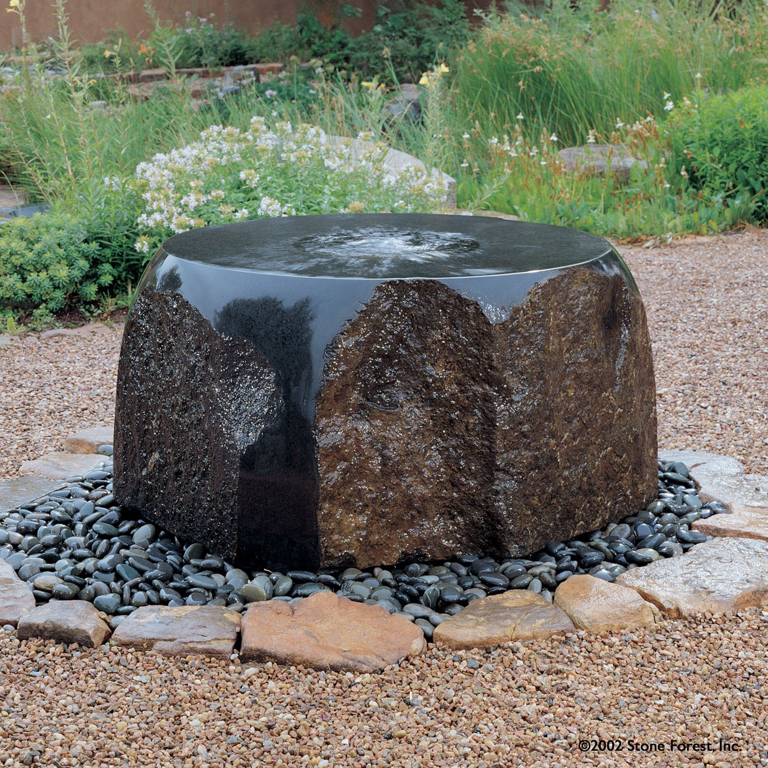 Maru Garden Fountain carved from basalt.