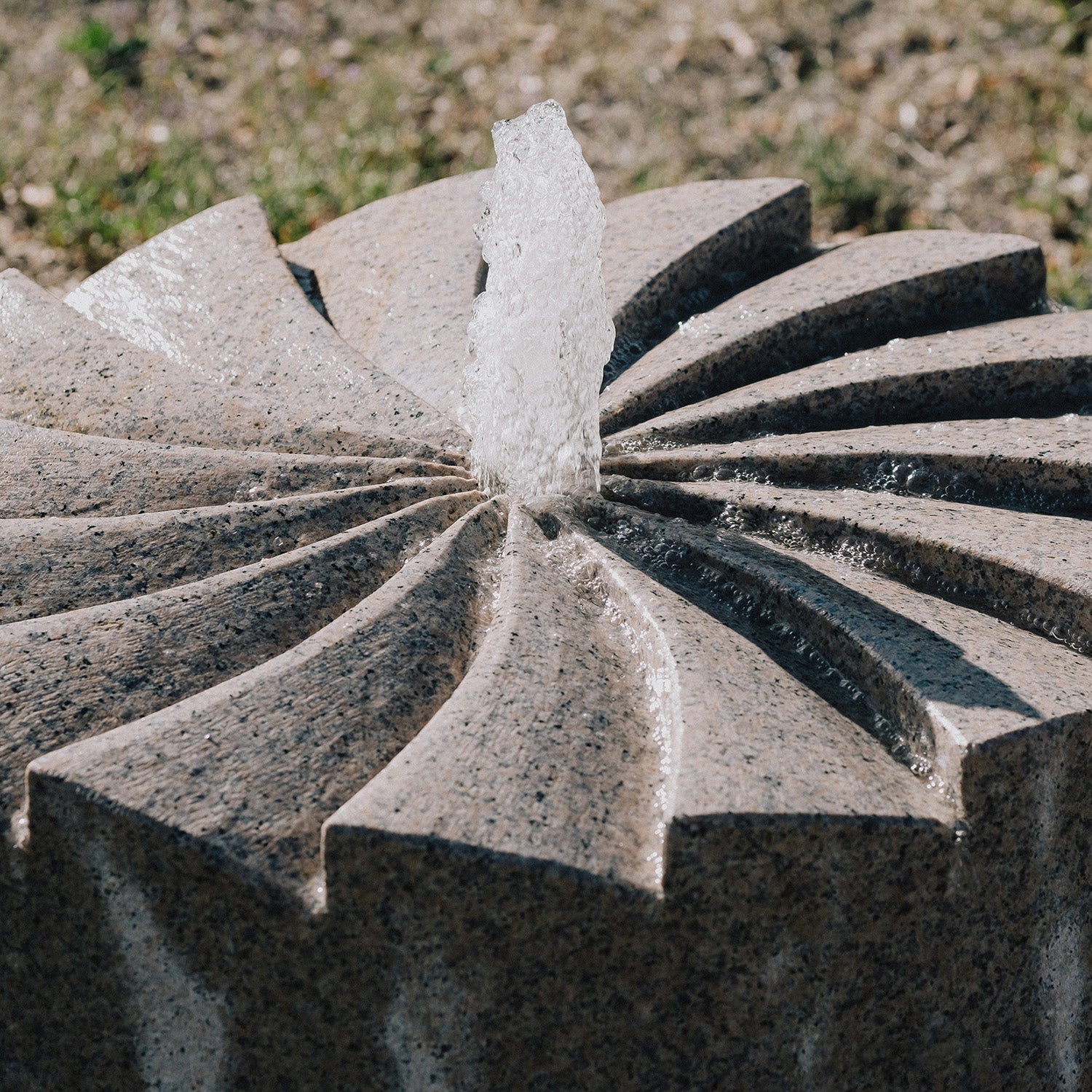 Millstone Fountain carved from Rose Granite