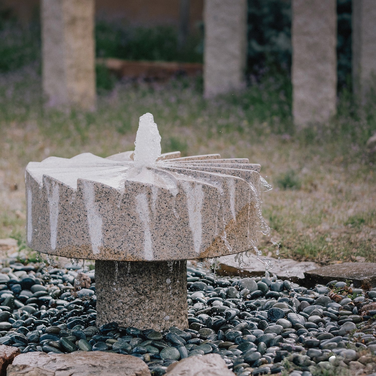 Millstone Fountain carved from Rose Granite