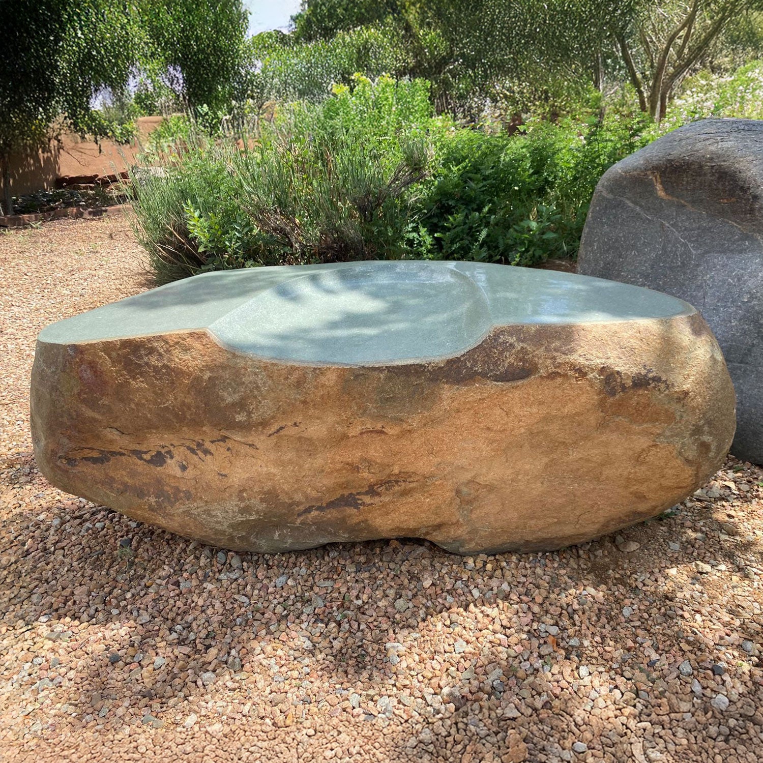 One of a kind Sculptural Barrier / stone seat, carved from a solid block of granite