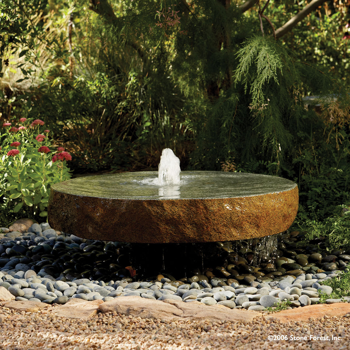 Stone Forest Natural Millstone garden fountain carved from  granite image 2 of 4