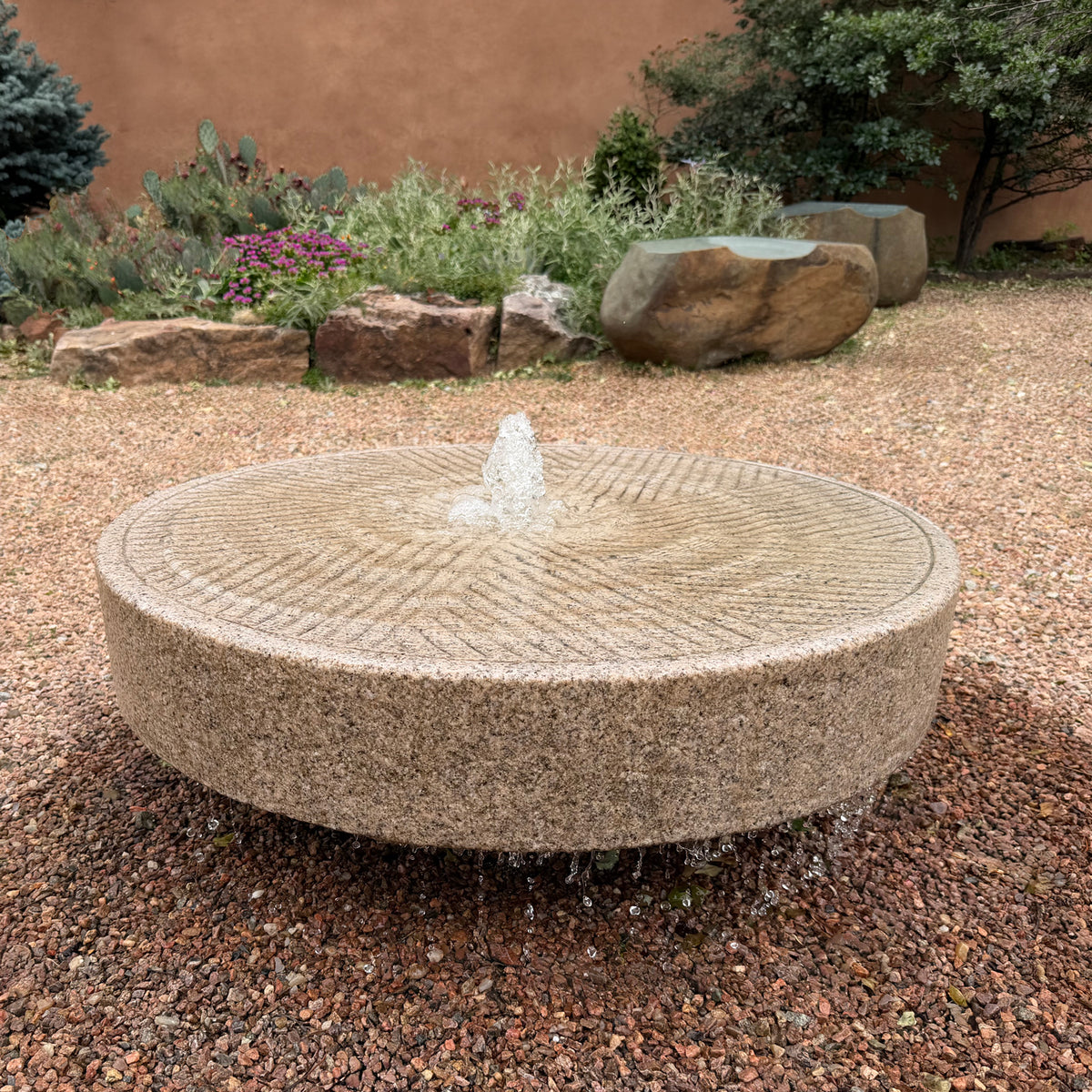 Old World Millstone Fountain in beige granite
