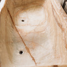 Detail of a large, rectangular onyx trough planter with multi-color patterns, 