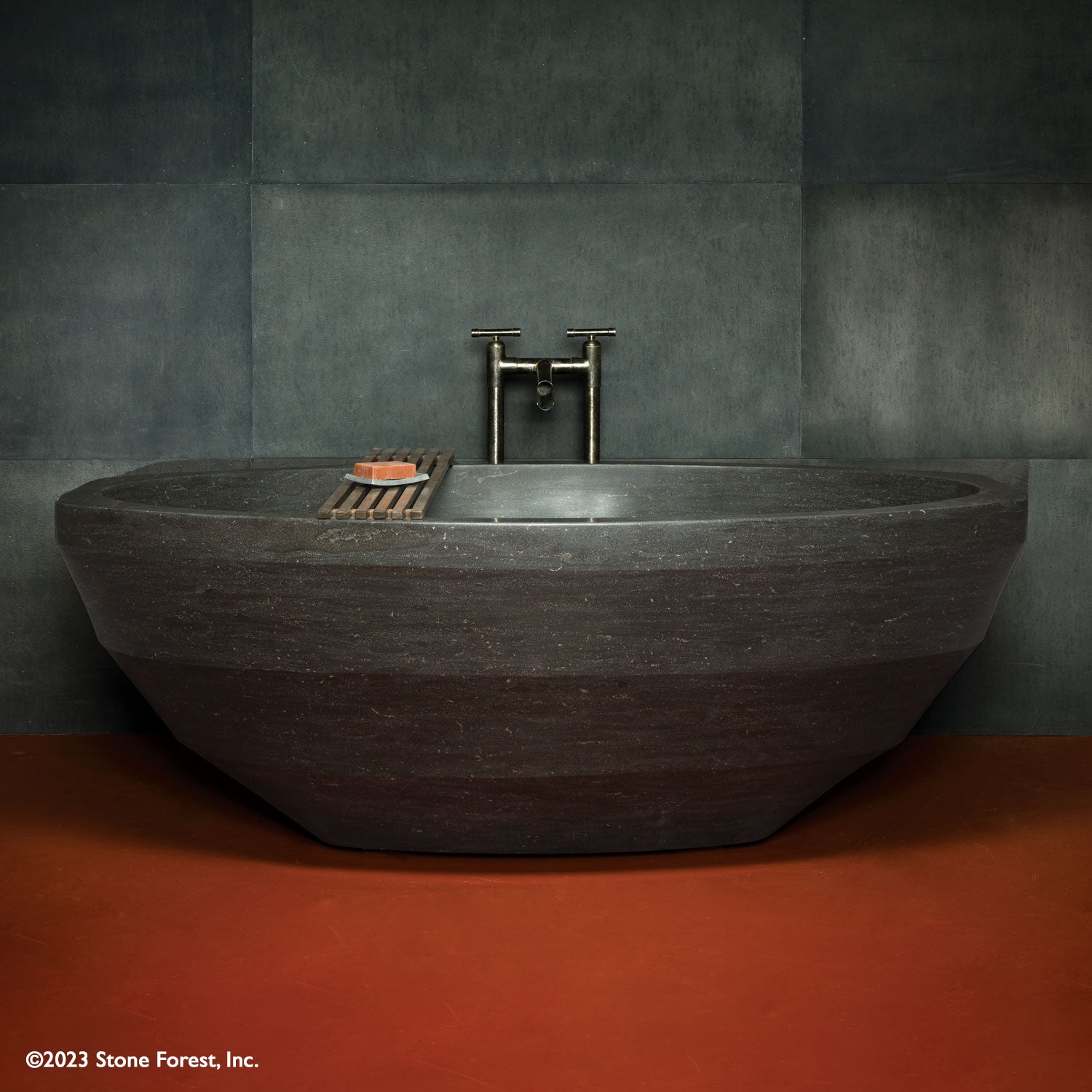 Facet Bathtub in antique gray limestone