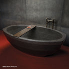 Facet Bathtub in antique gray limestone, top angle